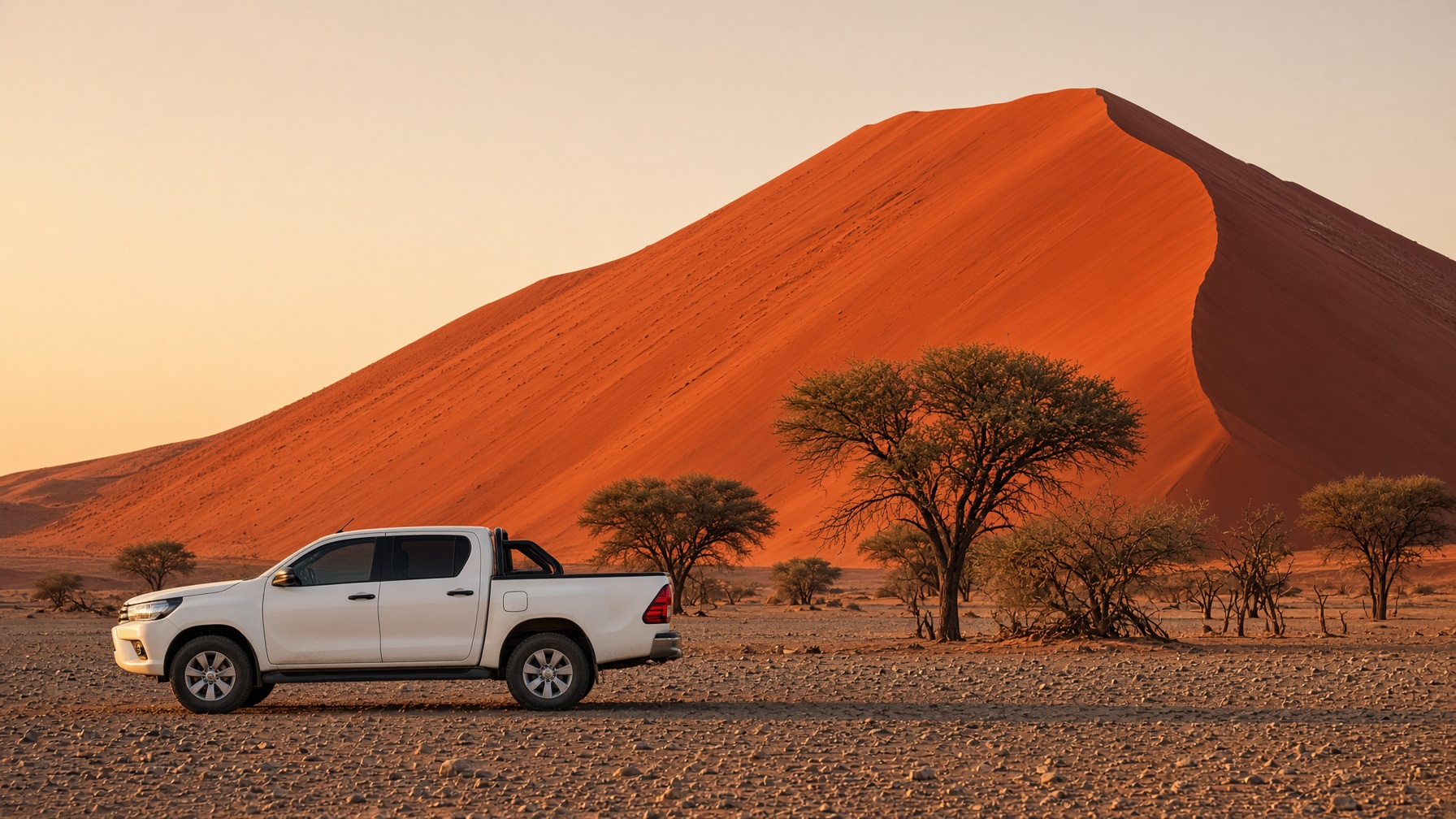 Bakkie at the foot of a Sossusvlei dune